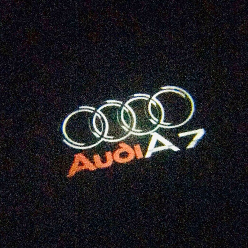 AUDI A7  LOGO PROJECTOT LIGHTS Nr.45 (quantity 1 = 2 Logo Films /2 door lights）