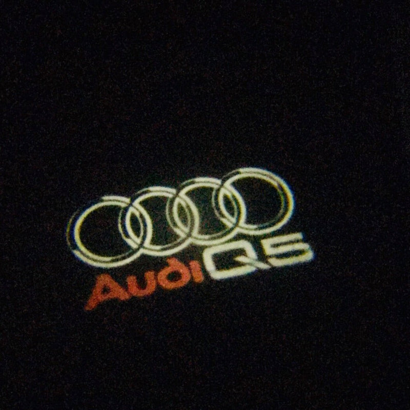 AUDI Q5 LOGO PROJECTOT LIGHTS Nr.48  (quantity 1 = 2 Logo Films /2 door lights）