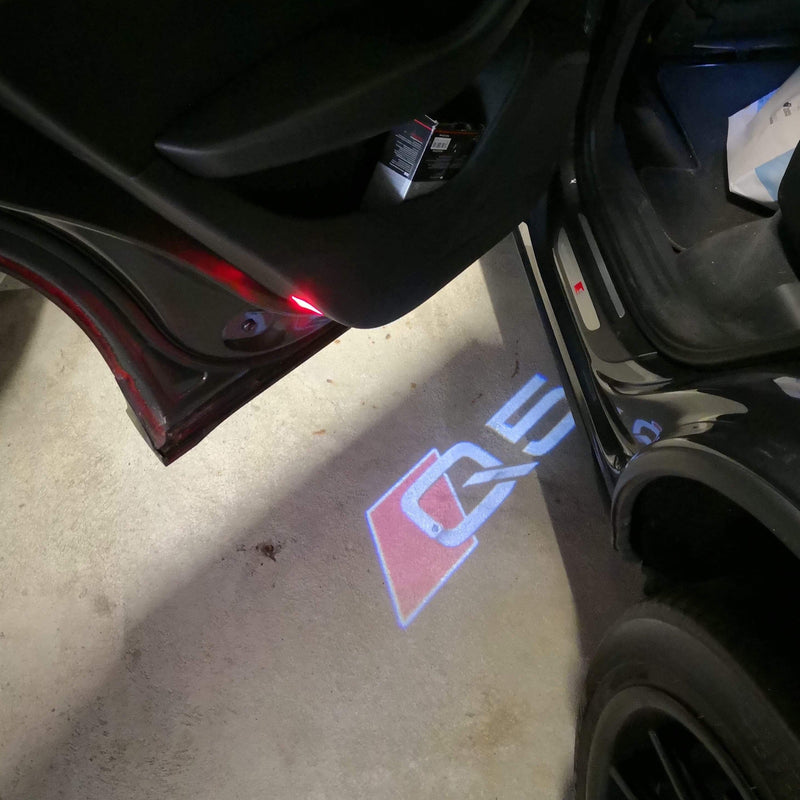 AUDI Q5 LOGO PROJECTOT LIGHTS Nr.78  (quantity 1 = 2 Logo Films /2 door lights）