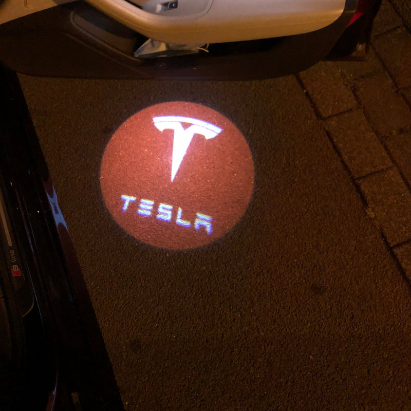 TESLA LOGO PROJECROTR LIGHTS Nr.1515 (quantity  1 =  2 Logo Film /  2 door lights)