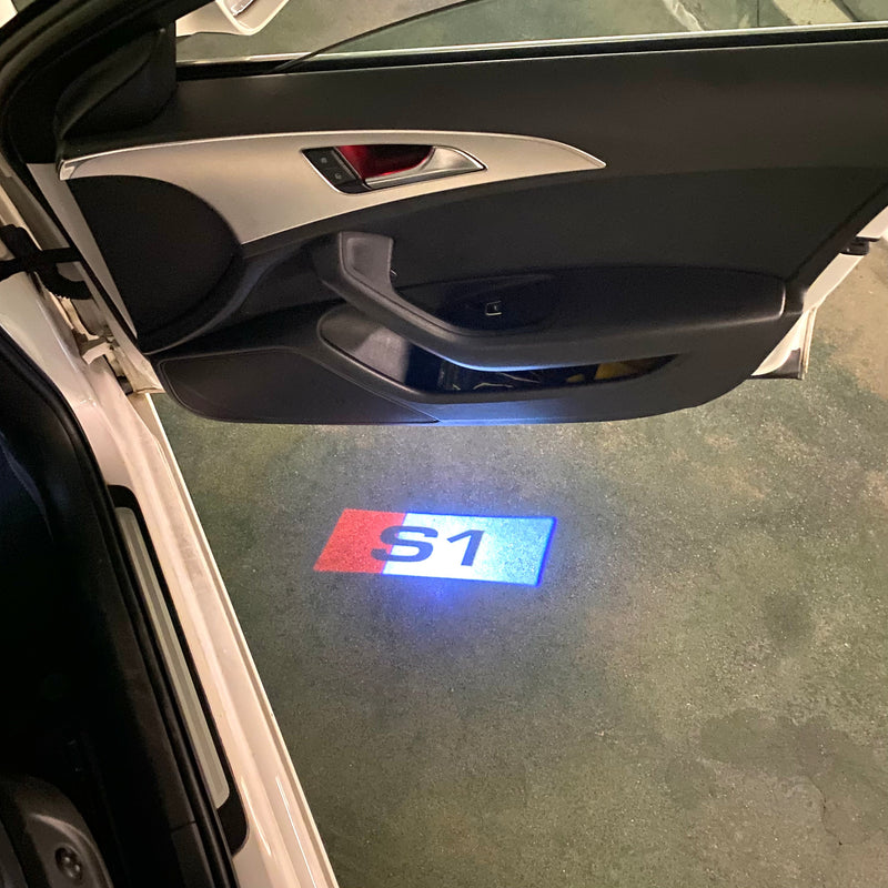 AUDI S1  LOGO PROJECTOT LIGHTS Nr.127  (quantity 1 = 2 Logo Films /2 door lights）