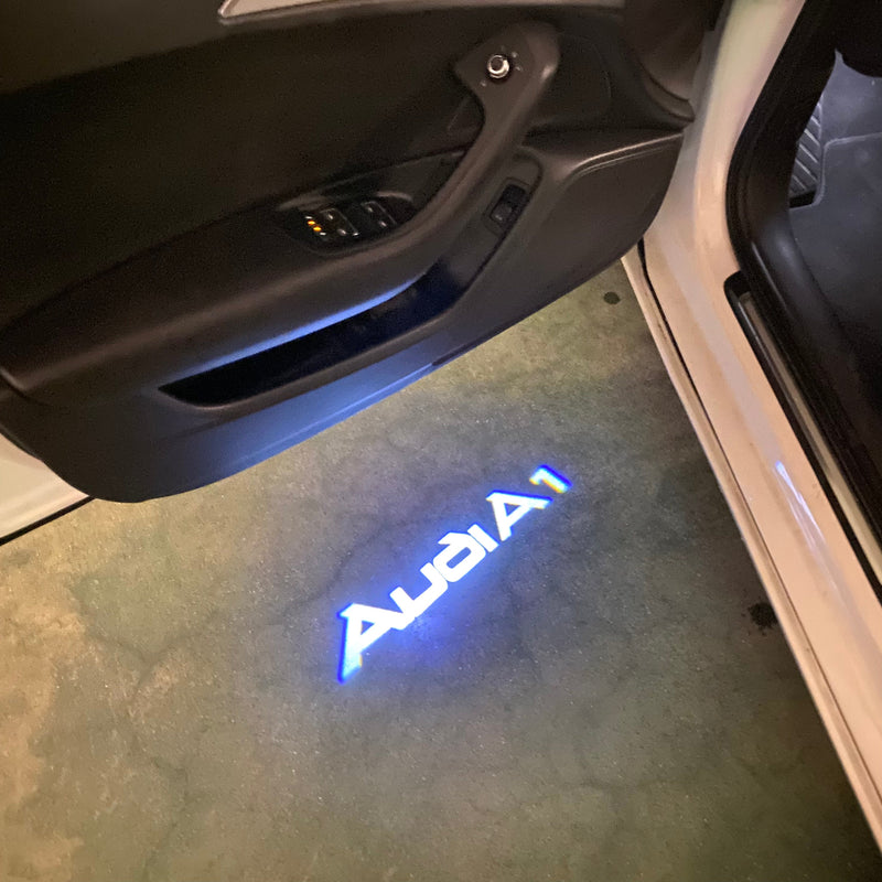 AUDI A1  LOGO PROJECTOT LIGHTS Nr.148  (quantity 1 = 2 Logo Films /2 door lights）