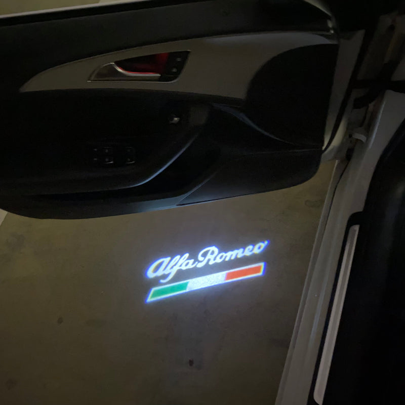 Alfa Romeo WHITE COLOR LOGO PROJECTOT LIGHTS Nr.21u (quantity  1 =  2 Logo Film /  2 door lights)