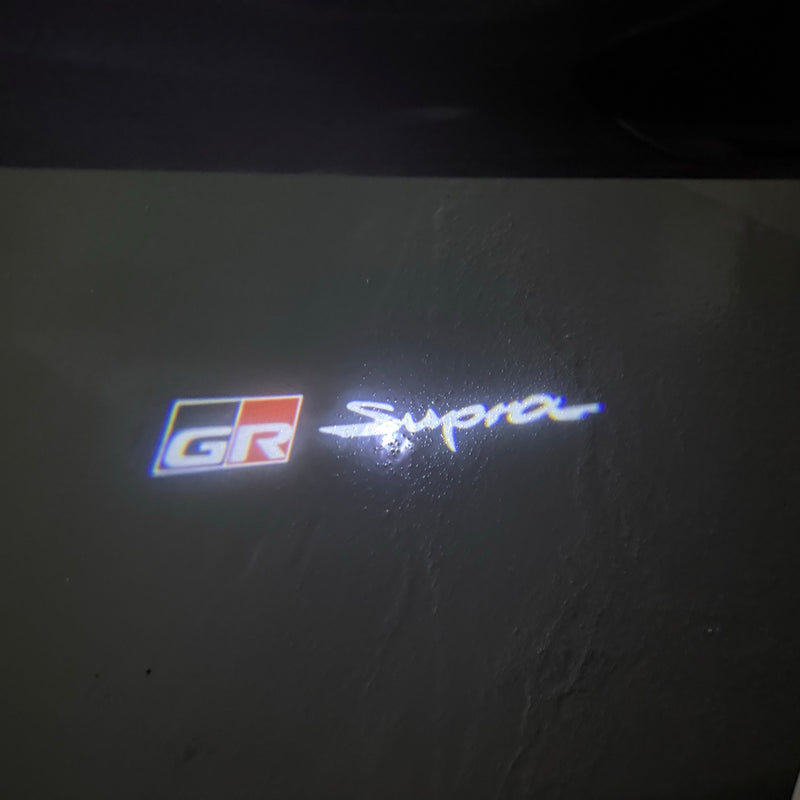 Toyota  Orignal LOGO PROJECROTR LIGHTS Nr.02 (quantity 1 = 1 sets/2 door lights)T68