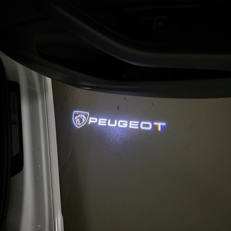 PEUGEOT ORIGINAL LOGO PROJECTOT LIGHTS    (quantity 1 = 2 Logo Films /2 door lights）Nr.30HH19