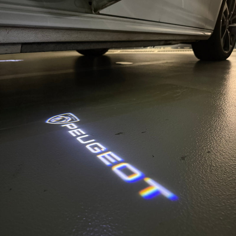 PEUGEOT ORIGINAL LOGO PROJECTOT LIGHTS    (quantity 1 = 2 Logo Films /2 door lights）Nr.30HH19