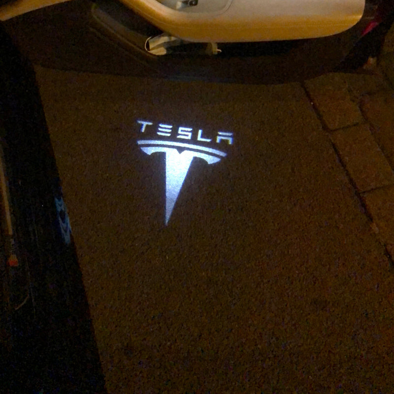 TESLA LOGO PROJECROTR LIGHTS Nr.1510 (quantity  1 =  2 Logo Film /  2 door lights)