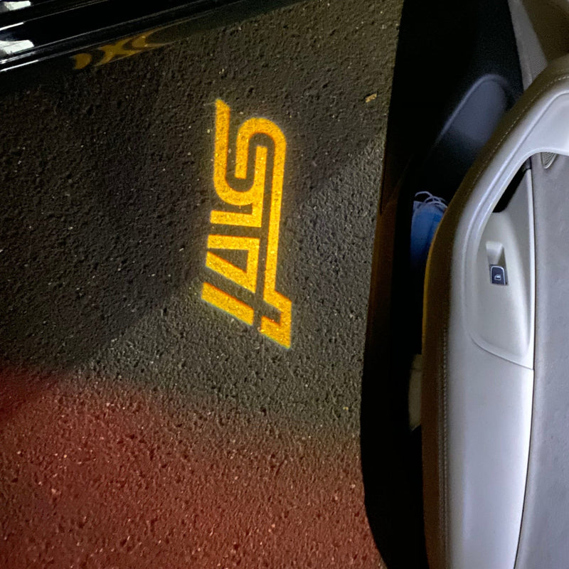 SUBARU STI  LOGO PROJECROTR LIGHTS Nr.03 (quantity 1 = 1 sets/2 door lights)