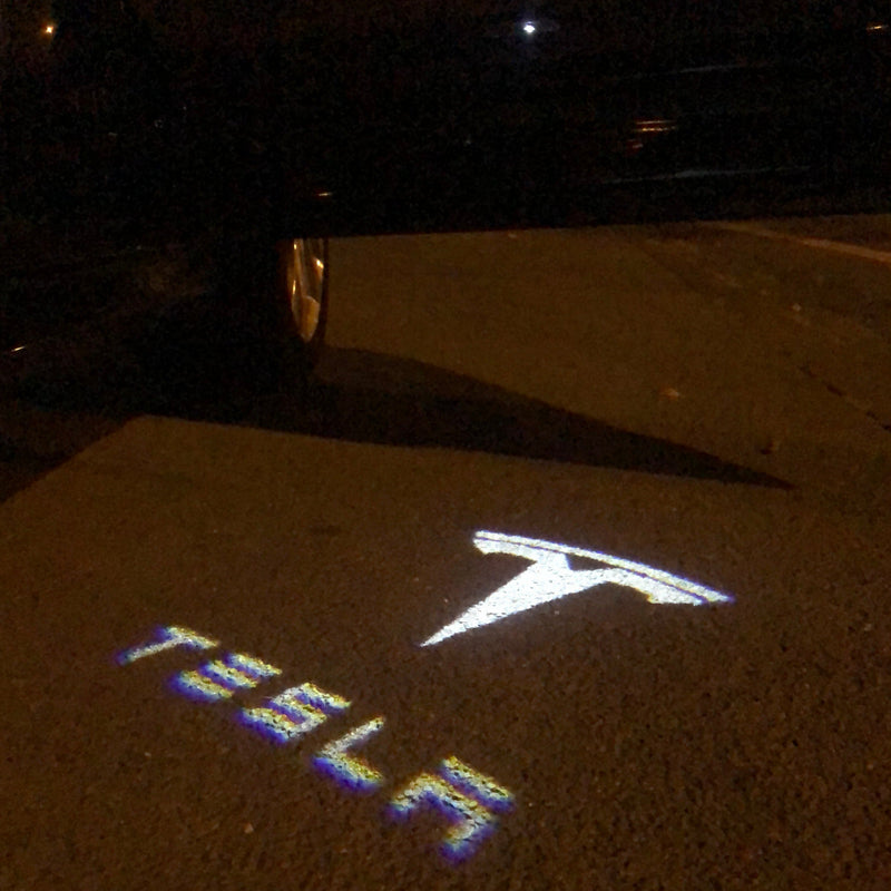 TESLA LOGO PROJECROTR LIGHTS Nr.1501 (quantity  1 =  2 Logo Film /  2 door lights)