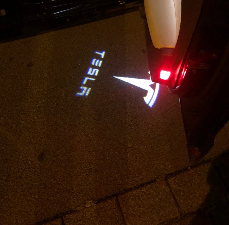 TESLA LOGO PROJECROTR LIGHTS Nr.1501 (quantity  1 =  2 Logo Film /  2 door lights)