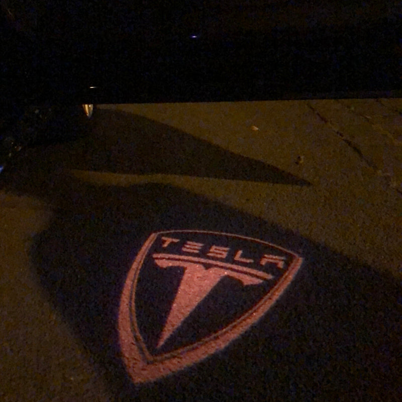 TESLA LOGO PROJECROTR LIGHTS Nr.1507 (quantity  1 =  2 Logo Film /  2 door lights)