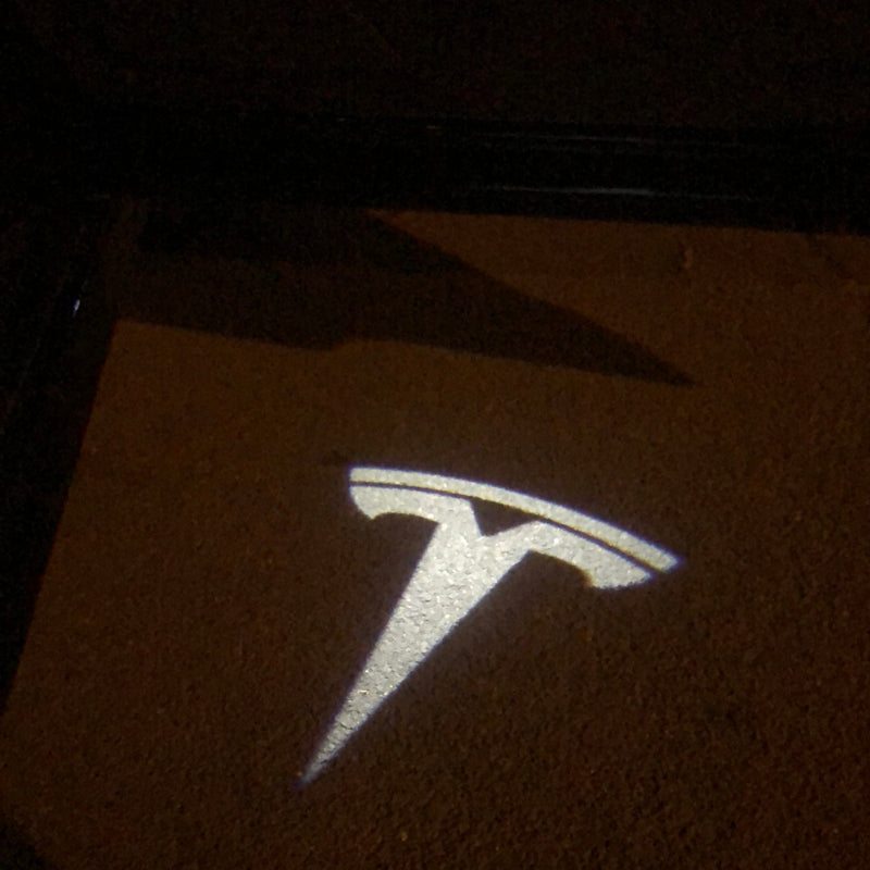 TESLA LOGO PROJECROTR LIGHTS Nr.1518 (quantity  1 =  2 Logo Film /  2 door lights)