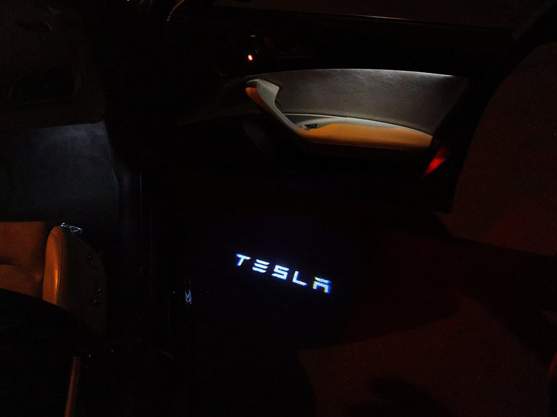 TESLA LOGO PROJECROTR LIGHTS Nr.1517 (quantity  1 =  2 Logo Film /  2 door lights)