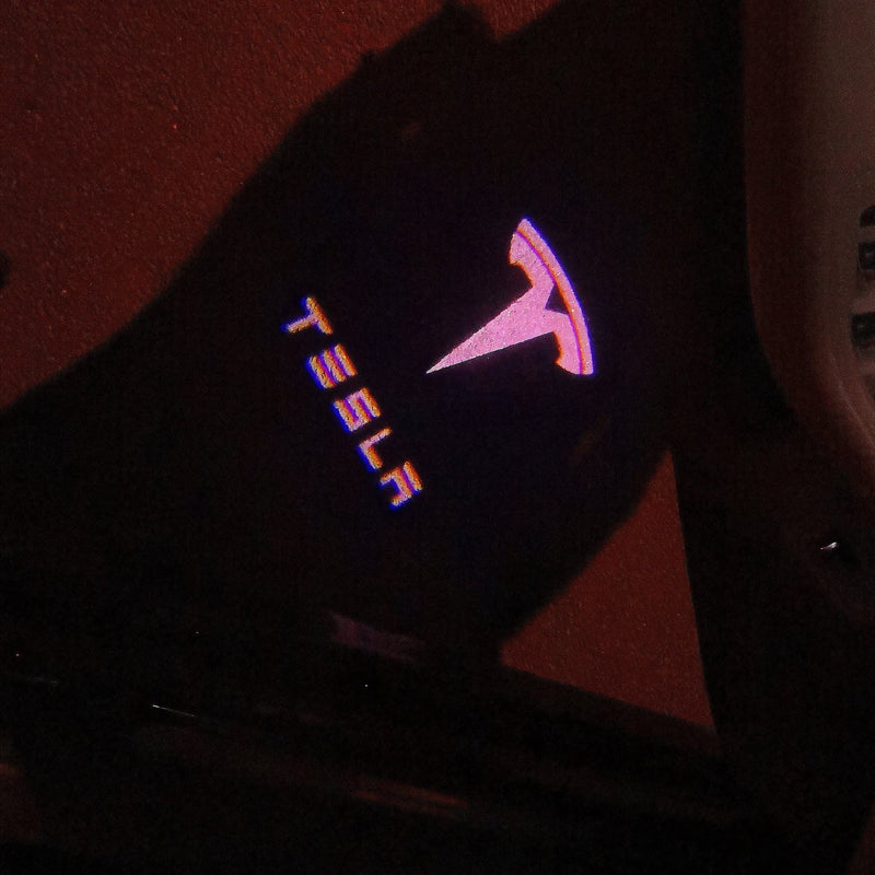 TESLA LOGO PROJECROTR LIGHTS Nr.1513 (quantity  1 =  2 Logo Film /  2 door lights)