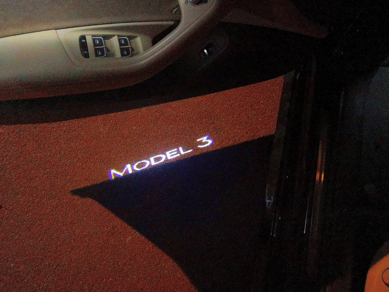 TESLA MODEL 3 LOGO PROJECROTR LIGHTS Nr.1524 (quantity  1 =  2 Logo Film /  2 door lights)