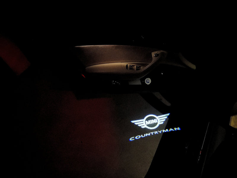 MINI COUNTRYMAN LOGO PROJECROTR LIGHTS Nr.136 (quantity  1 =  2 Logo Film /  2 door lights)