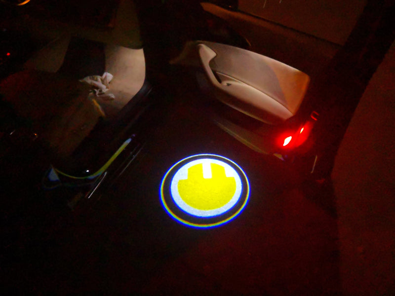 MINI ELECTRIC  LOGO PROJECROTR LIGHTS Nr.81 (quantity  1 =  2 Logo Film /  2 door lights)