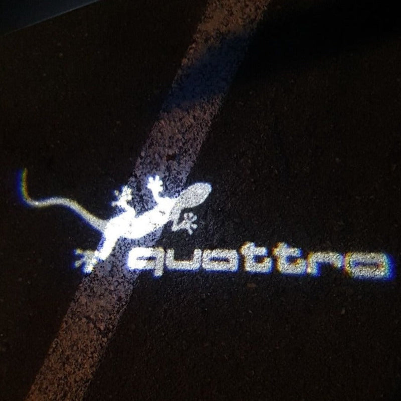 AUDI QUATTRO GECKO  LOGO PROJECTOT LIGHTS Nr.62  (quantity 1 = 2 Logo Films /2 door lights）