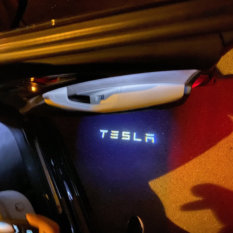 TESLA LOGO PROJECROTR LIGHTS Nr.1503 (quantity  1 =  2 Logo Film /  2 door lights)