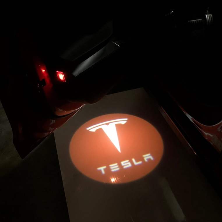 TESLA LOGO PROJECROTR LIGHTS Nr.1515 (quantity  1 =  2 Logo Film /  2 door lights)