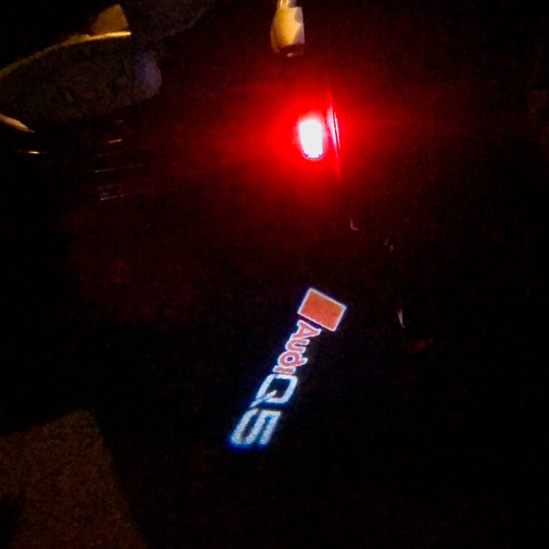 AUDI Q5 LOGO PROJECTOT LIGHTS Nr.81  (quantity 1 = 2 Logo Films /2 door lights）