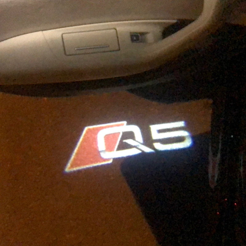 AUDI Q5 LOGO PROJECTOT LIGHTS Nr.78  (quantity 1 = 2 Logo Films /2 door lights）