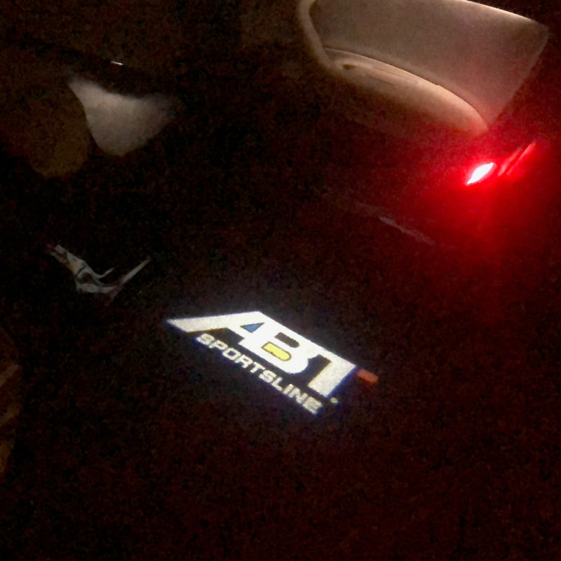 AUDI ABT LOGO PROJECTOT LIGHTS Nr.124 (quantity  1 =  2 Logo Film  &2 door lights)