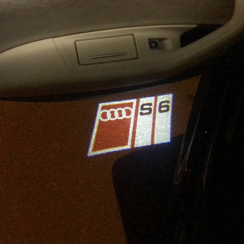 AUDI S6  LOGO PROJECTOT LIGHTS Nr.150  (quantity 1 = 2 Logo Films /2 door lights）