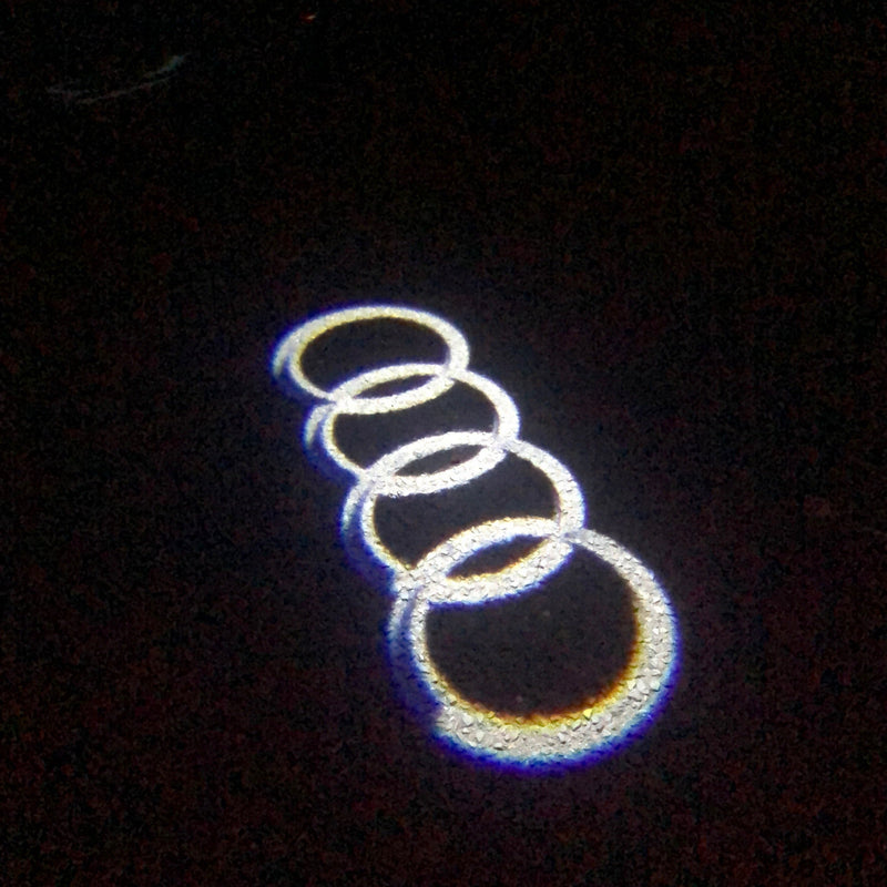 AUDI 4 RINGS LOGO PROJECTOT LIGHTS Nr.04  (quantity 1 = 2 Logo Films /2 door lights）