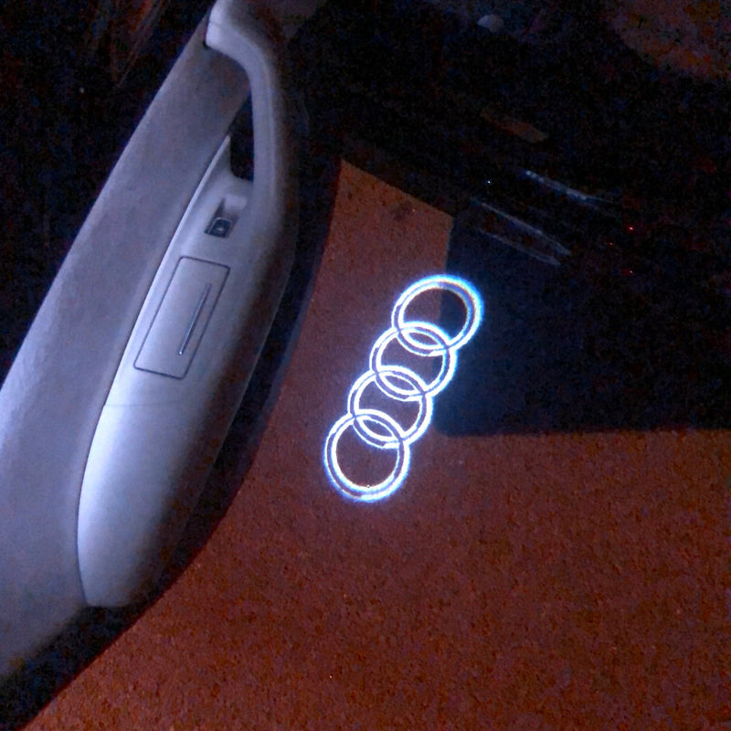 AUDI 4 RINGS LOGO PROJECTOT LIGHTS Nr.09  (quantity 1 = 2 Logo Films /2 door lights）