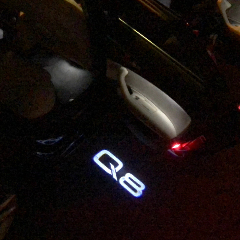 AUDI Q8 LOGO PROJECTOT LIGHTS Nr.102   (quantity 1 = 2 Logo Films /2 door lights）