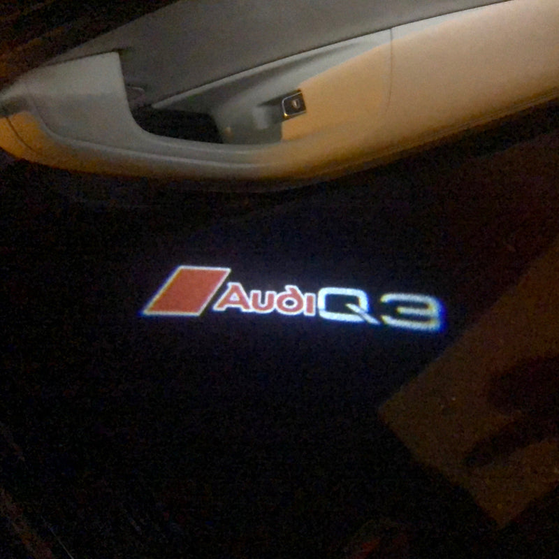 AUDI Q3 LOGO PROJECTOT LIGHTS Nr.90 (quantity 1 = 2 Logo Films /2 door lights）