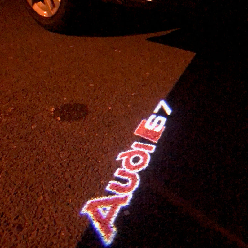 AUDI S7  LOGO PROJECTOT LIGHTS Nr.93  (quantity 1 = 2 Logo Films /2 door lights）