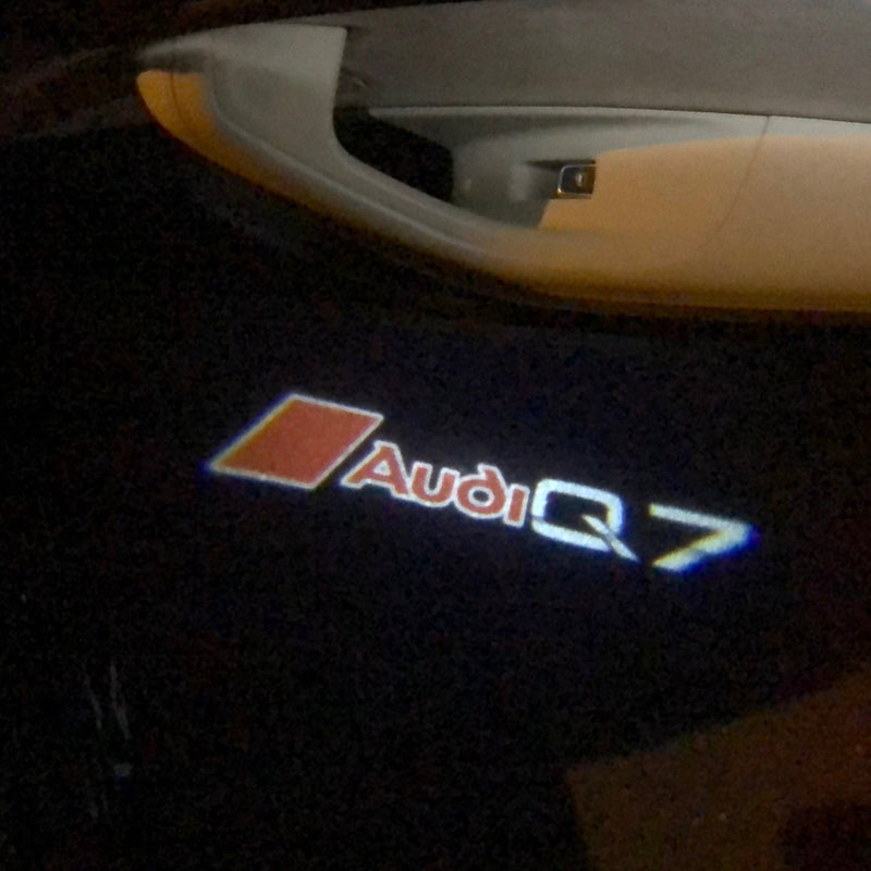 AUDI Q7 LOGO PROJECTOT LIGHTS Nr.82  (quantity 1 = 2 Logo Films /2 door lights）