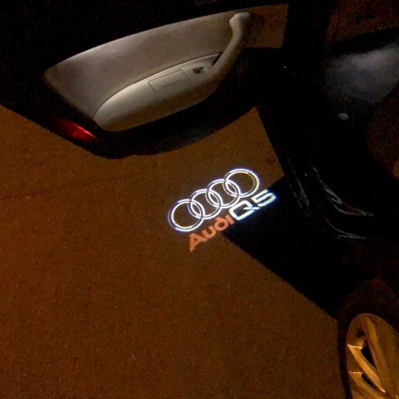 AUDI Q5 LOGO PROJECTOT LIGHTS Nr.48  (quantity 1 = 2 Logo Films /2 door lights）