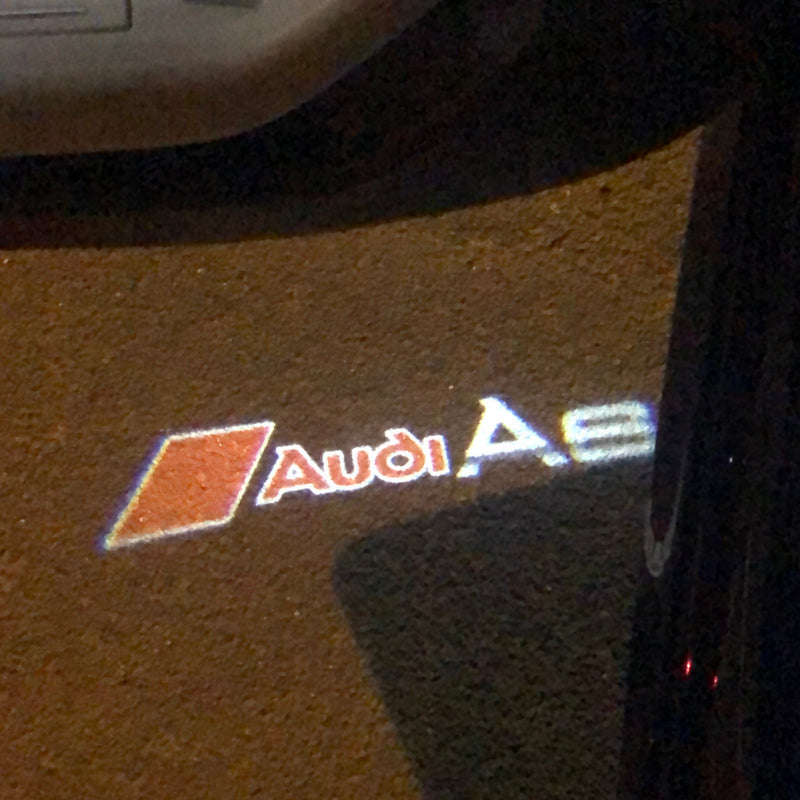 AUDI A6 LOGO PROJECTOT LIGHTS Nr.40  (quantity 1 = 2 Logo Films /2 door lights）