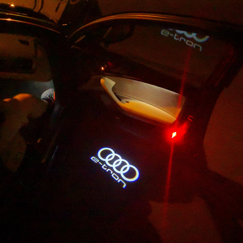 AUDI E-TRON LOGO PROJECTOT LIGHTS Nr.16  (quantity 1 = 2 Logo Films /2 door lights）